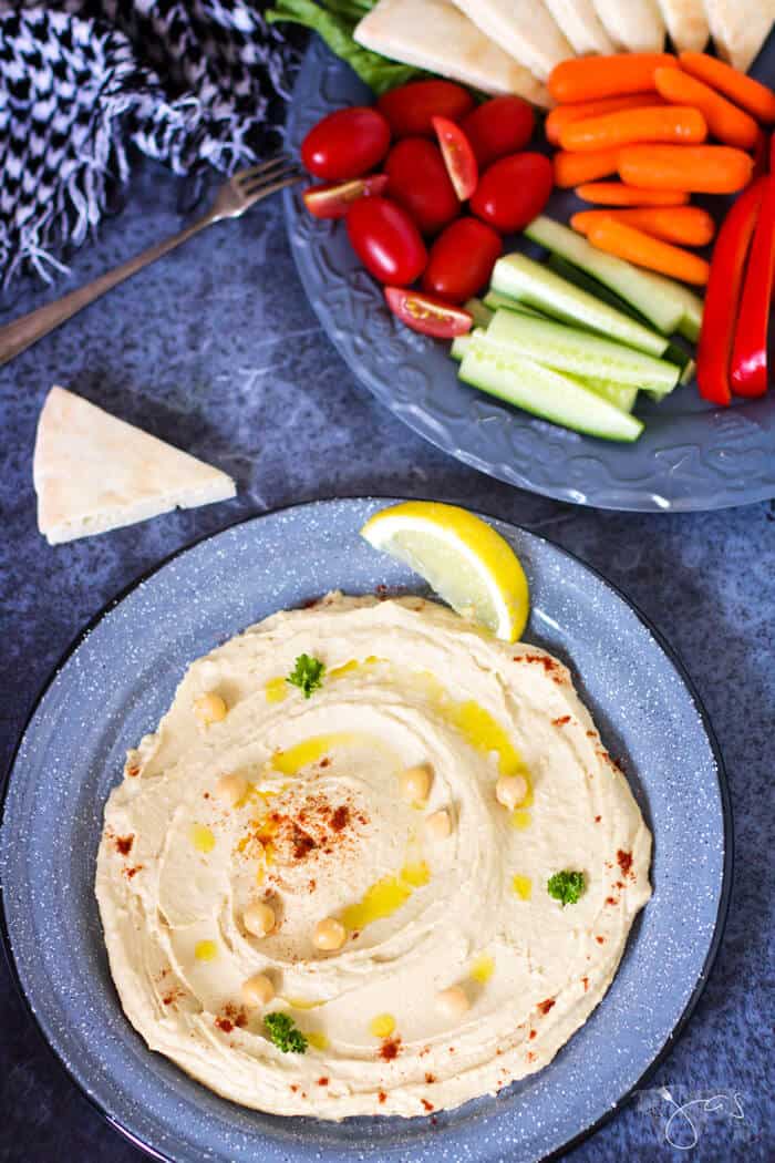 Easy and quick to make homemade hummus with chickpeas, tahini, garlic, lemon juice, and olive oil