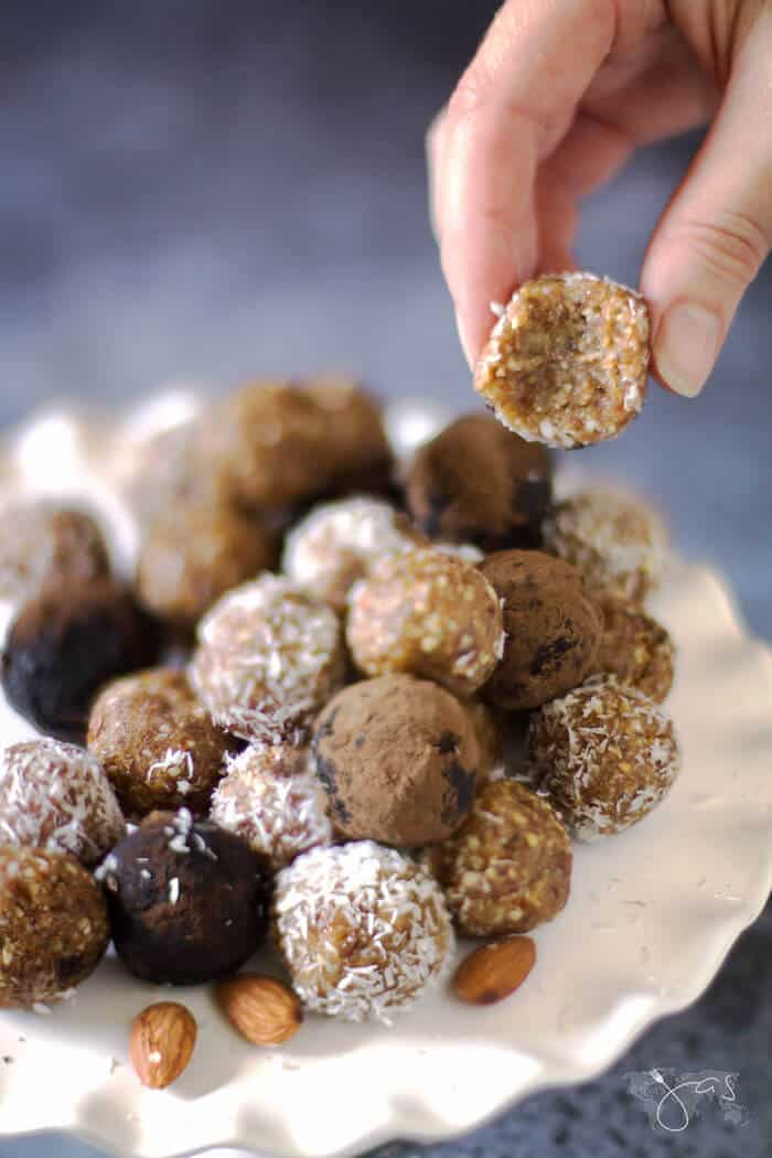 Sweet bite full of energy made easy with coconut, almonds, and dates.