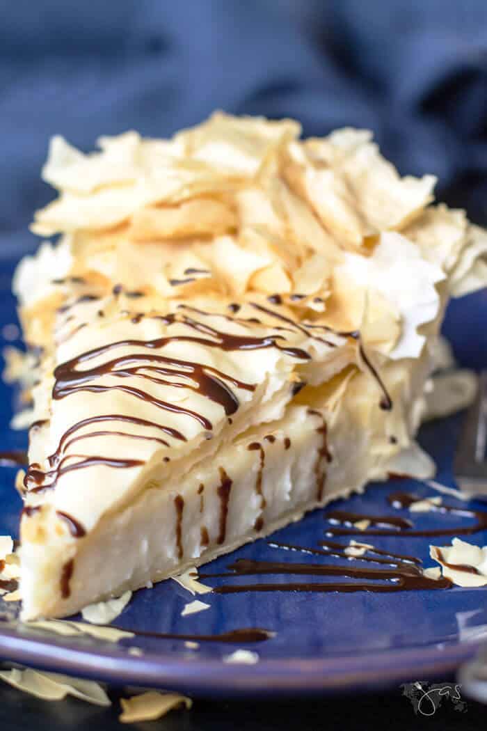 A slice of Hoosier cream pie drizzled with chocolate sauce. 