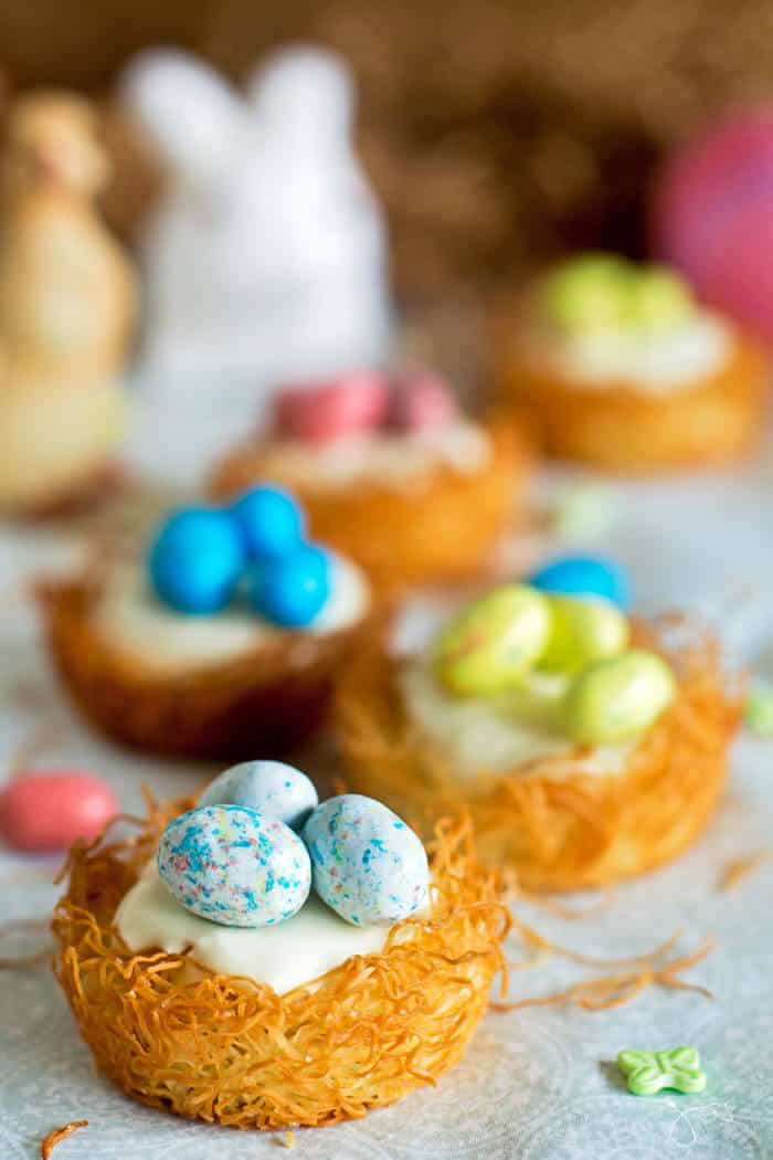 Top these creamy no-bake cheesecake nests with some candy eggs for a sweet Easter treat
